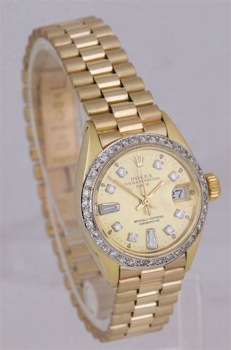 gold Rolex with diamond bezel